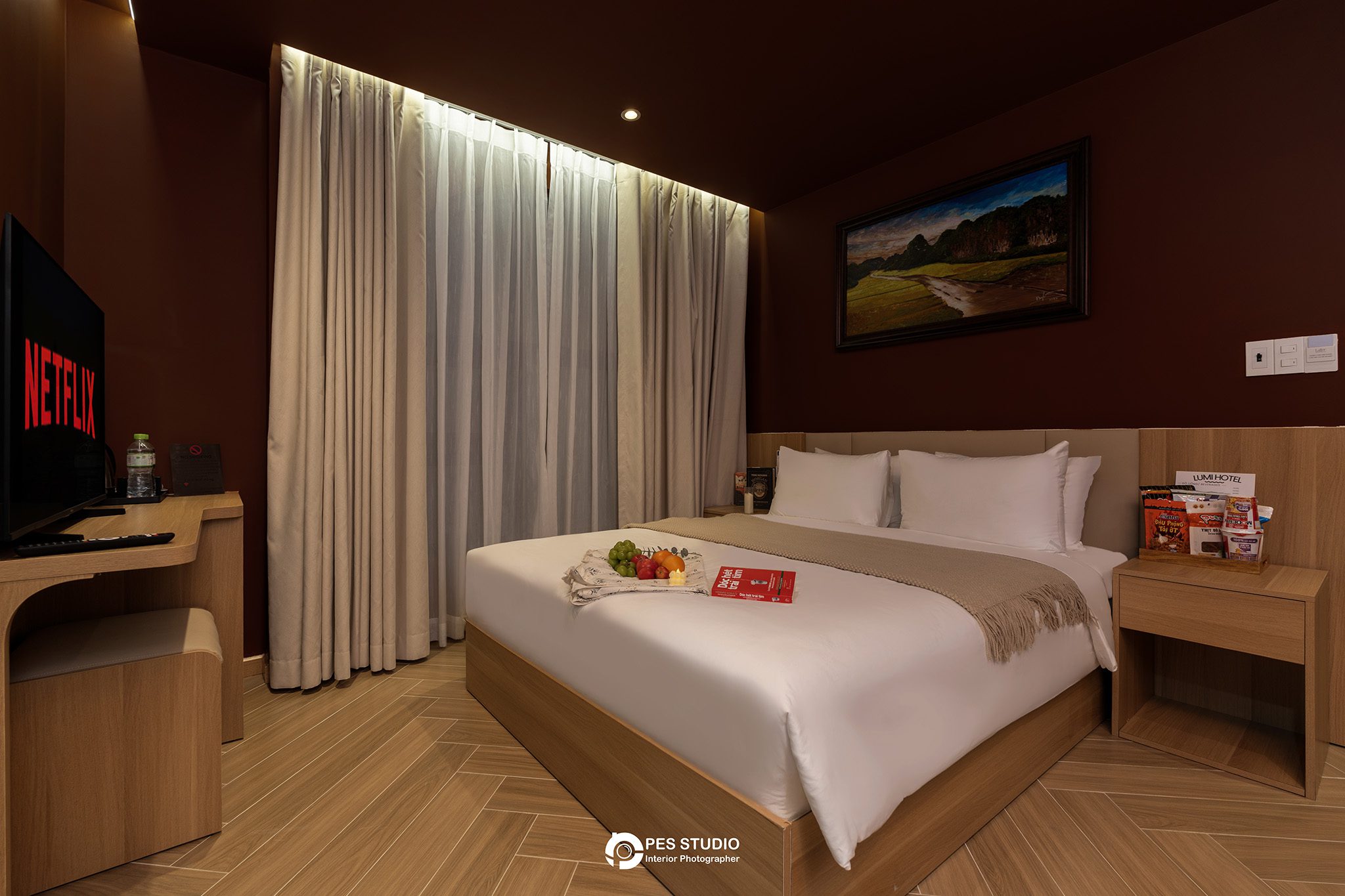 Phòng twin khách sạn Lumi Riverside với hai giường đơn
